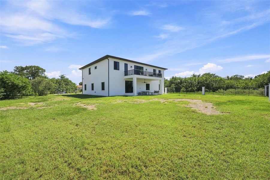 Exterior details and patio area of a home in , Port Richey (Image 27).