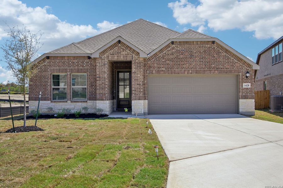 Front exterior of a new home in Arcadia Ridge - Classic Series, San Antonio, TX, highlighting curb appeal (Image 25).
