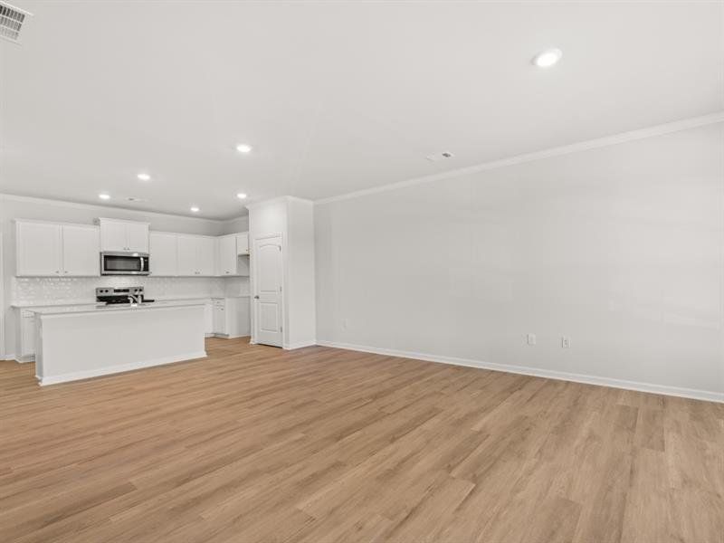 Spacious, unfurnished interior of a new home in Waypoint, Flowery Branch (Image 29).