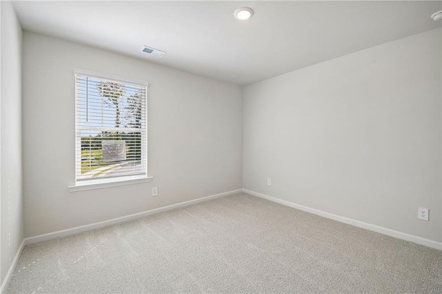 Spacious, unfurnished interior of a new home in Artisan Walk, Fairburn (Image 37).