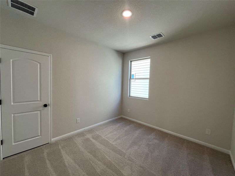 Spacious, unfurnished interior of a new home in The Cottages at Lariat, Liberty Hill (Image 21).