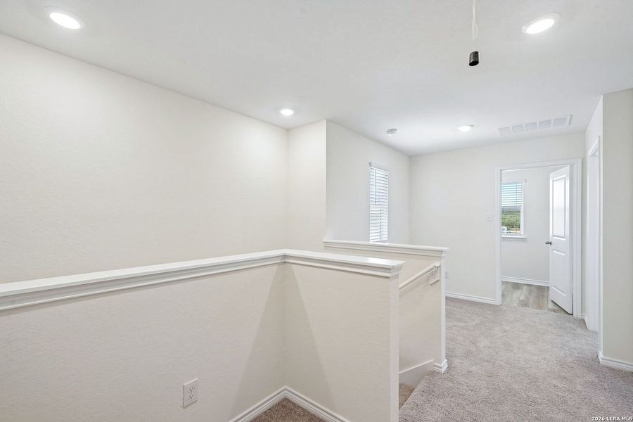 Spacious, unfurnished interior of a new home in Nagel Crossing, San Antonio (Image 20).