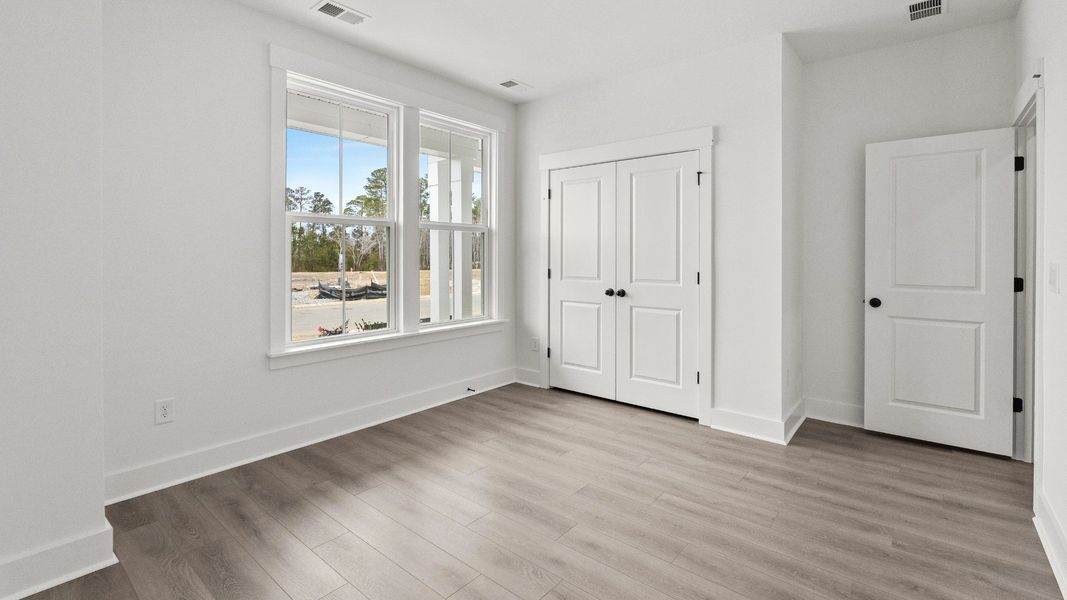 Furnished interior view inside a new home in Bluffs at Sun Colony, Little River (Image 18).
