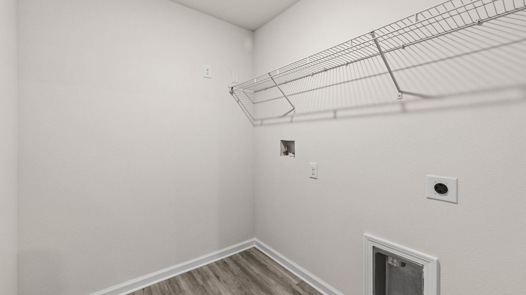 Representative unfurnished interior of a home built from the The Penwell by D.R. Horton in Titus Park, Panama City (Image 38).