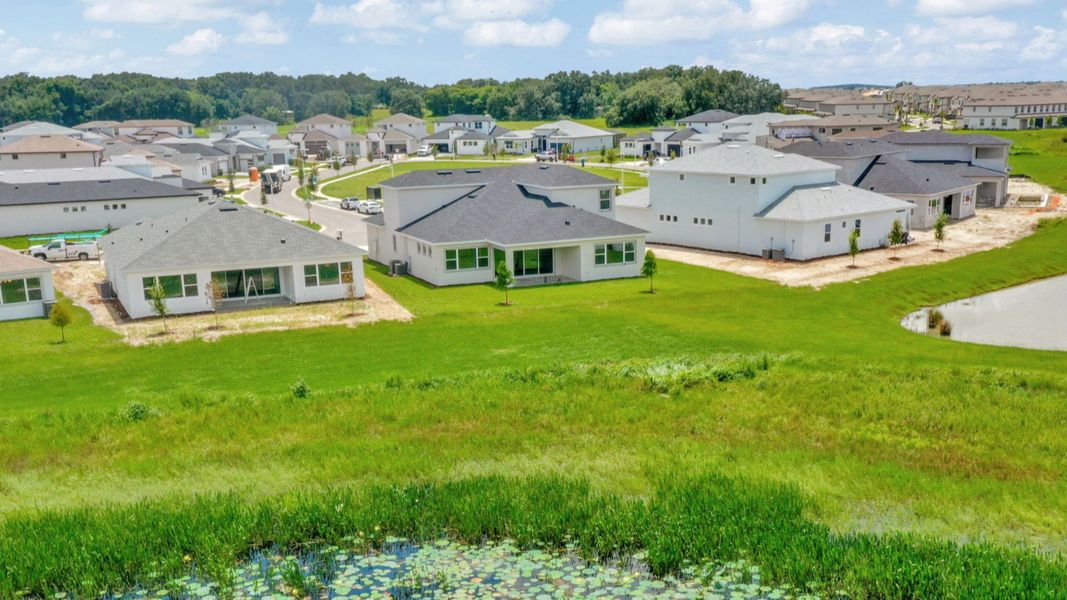Representative exterior photo of a completed home built from the Grand Hawk by DRB Homes in Eagles Cove at Mirada, San Antonio, FL (Image 26).