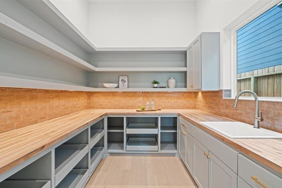 Look at this butler's pantry!! Under cabinet lighting, built in microwave & separate sink!!! Previous TOMO Homes project.