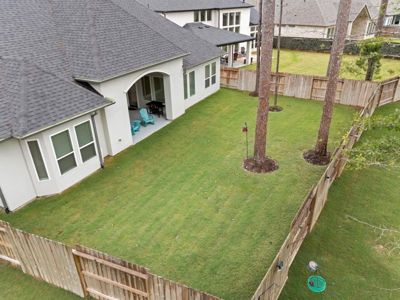 Exterior details and patio area of a home in , Conroe (Image 21).