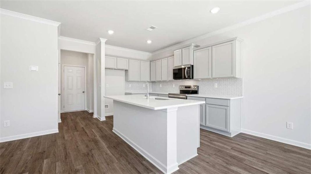 Furnished interior view inside a new home in Independence Villas and Townhomes, Loganville (Image 3).