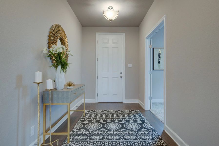 Representative furnished interior of a home built from the Cleburne by Ashton Woods in Mustang Oaks, San Antonio (Image 27).