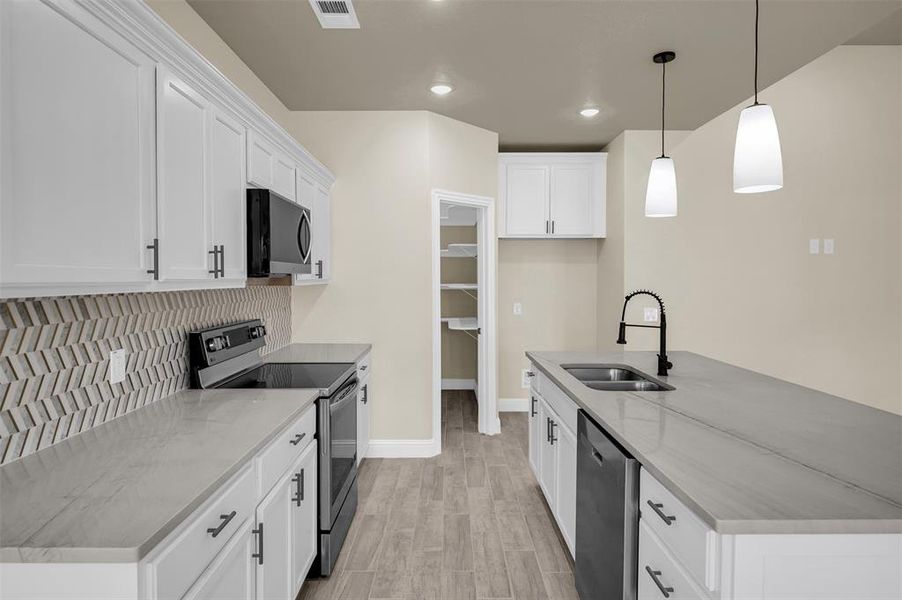 Furnished interior view inside a new home in , Runaway Bay (Image 12).