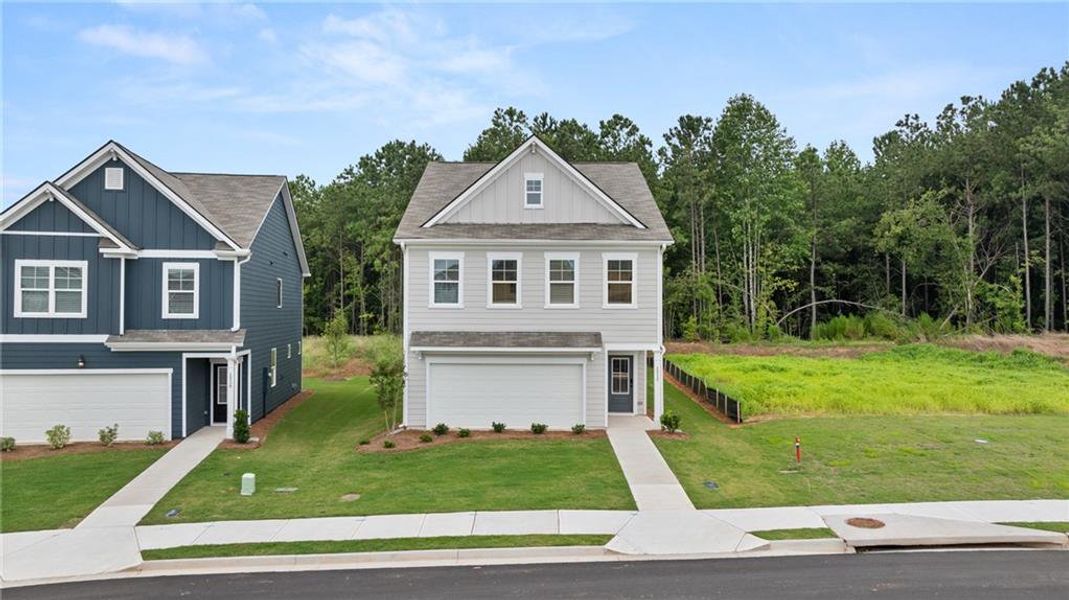 Front exterior of a new home in The Retreat at Walden Park, Jonesboro, GA, highlighting curb appeal (Image 22).