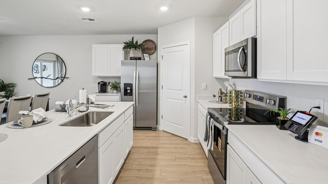 Furnished interior view inside a new home in Magnolia Landing Express, Fort Myers (Image 13).