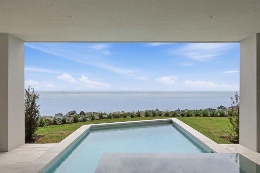 Exterior details and patio area of a home in , Sullivan's Island (Image 45).