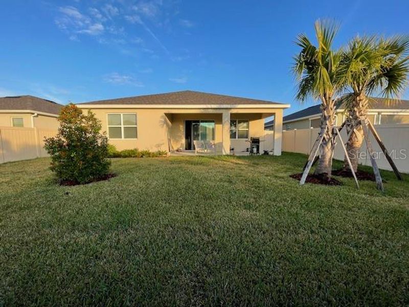 Exterior details and patio area of a home in Archers Mill, Ormond Beach (Image 3).