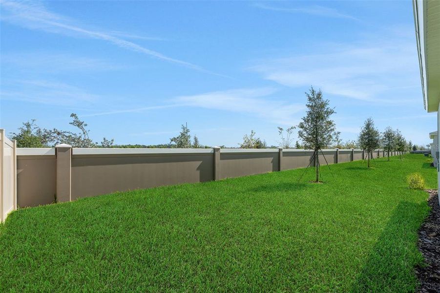 Exterior details and patio area of a home in Seaire, Parrish (Image 3).