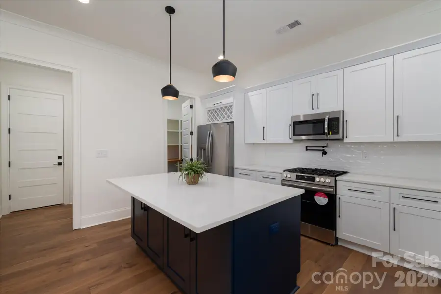 Furnished interior view inside a new home in , Belmont (Image 5).