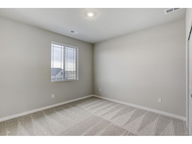 Spacious, unfurnished interior of a new home in Farmstead, Berthoud (Image 23).