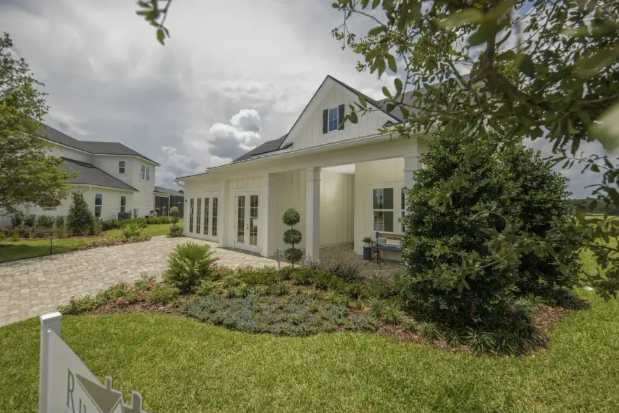 Representative exterior photo of a completed home built from the Ortega by Riverside Homes in Sagebrush at EverRange, Jacksonville, FL (Image 31).