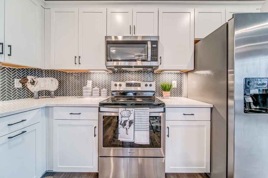 Representative furnished interior of a home built from the Crawford by Parkside Builders in The Woods, Gallatin (Image 11).
