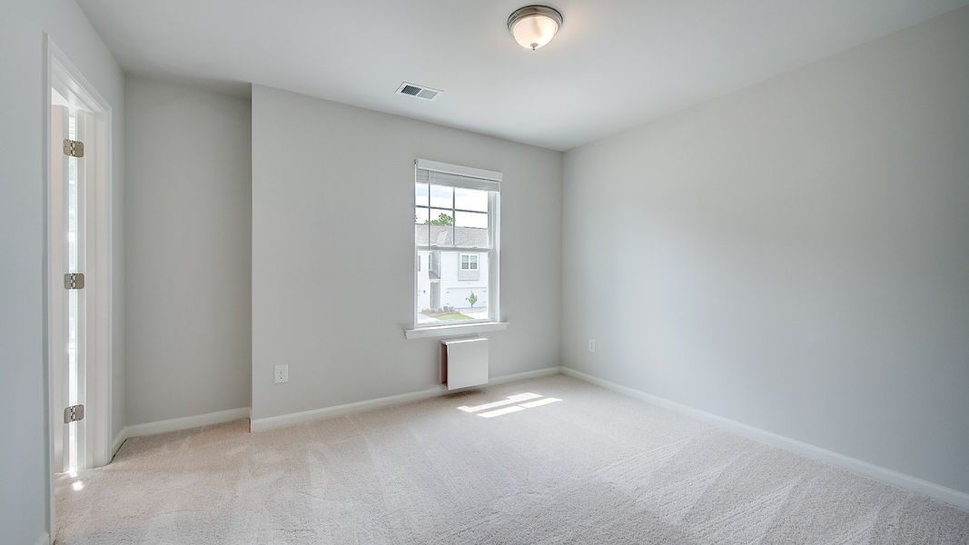 Furnished interior view inside a new home in Bowers Farm Townhomes, McDonough (Image 15).