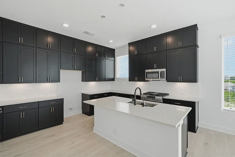 Representative furnished interior of a home built from the Athena by Chesmar Homes in Prominence Urban, San Antonio (Image 7).