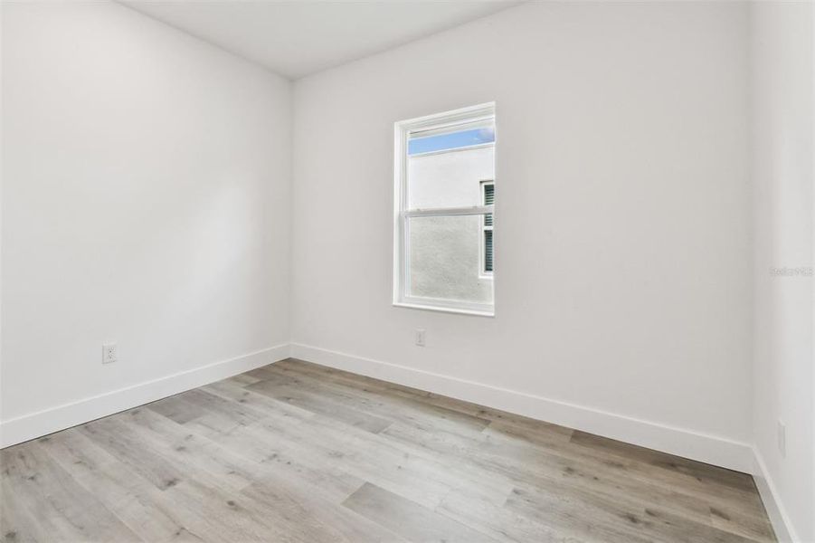 Spacious, unfurnished interior of a new home in The Peninsula at Rhodine Lake, Riverview (Image 37).