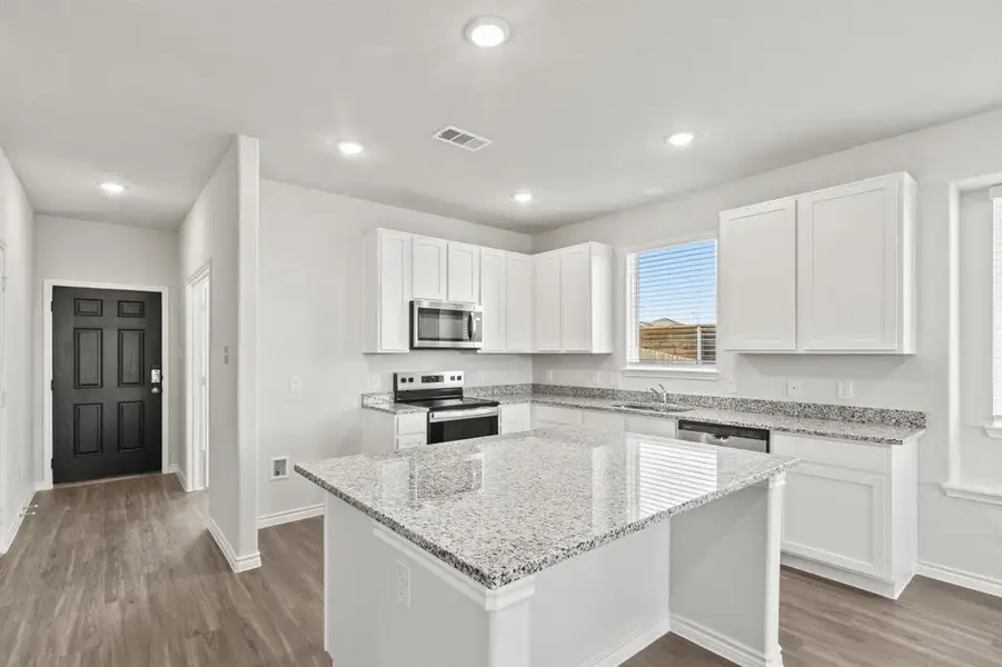 Furnished interior view inside a new home in Retreat at Fossil Creek, Fort Worth (Image 5). Furnished interior view inside a new home in Retreat at Fossil Creek, Fort Worth (Image 5).