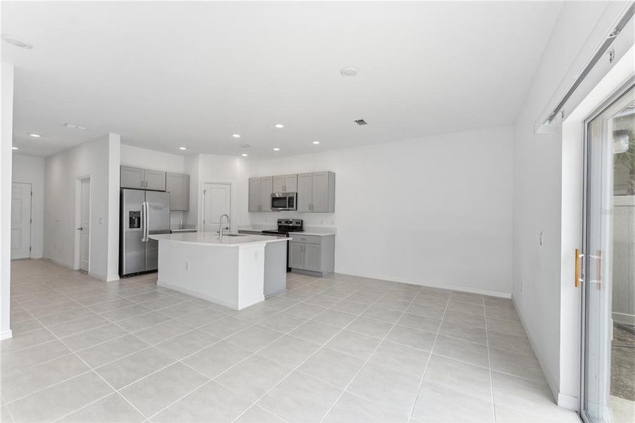 Furnished interior view inside a new home in , Kissimmee (Image 7).