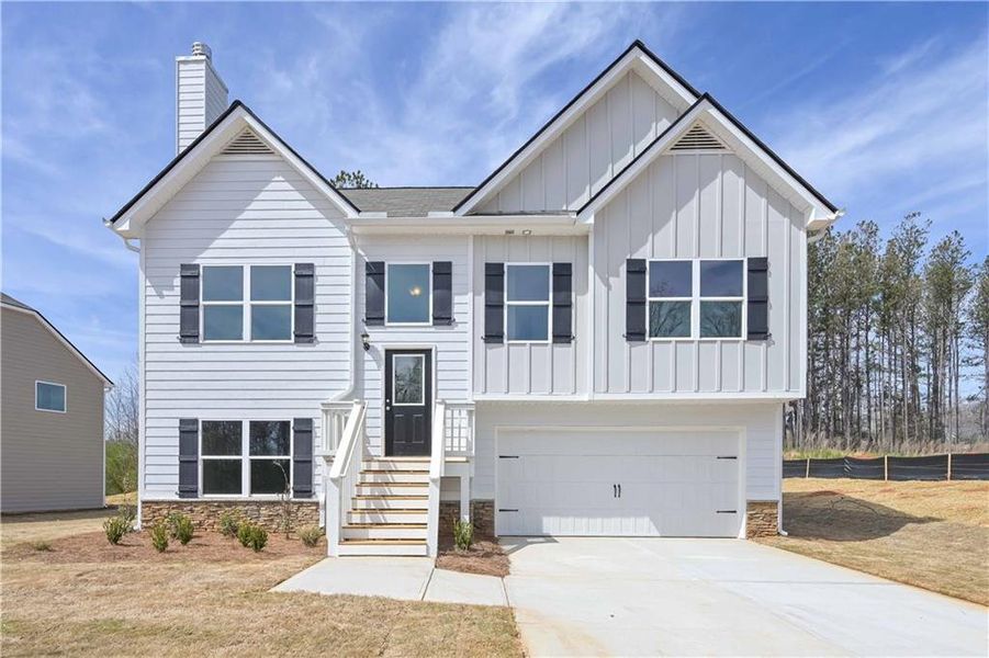 Front exterior of a new home in , Villa Rica, GA, highlighting curb appeal (Image 13).