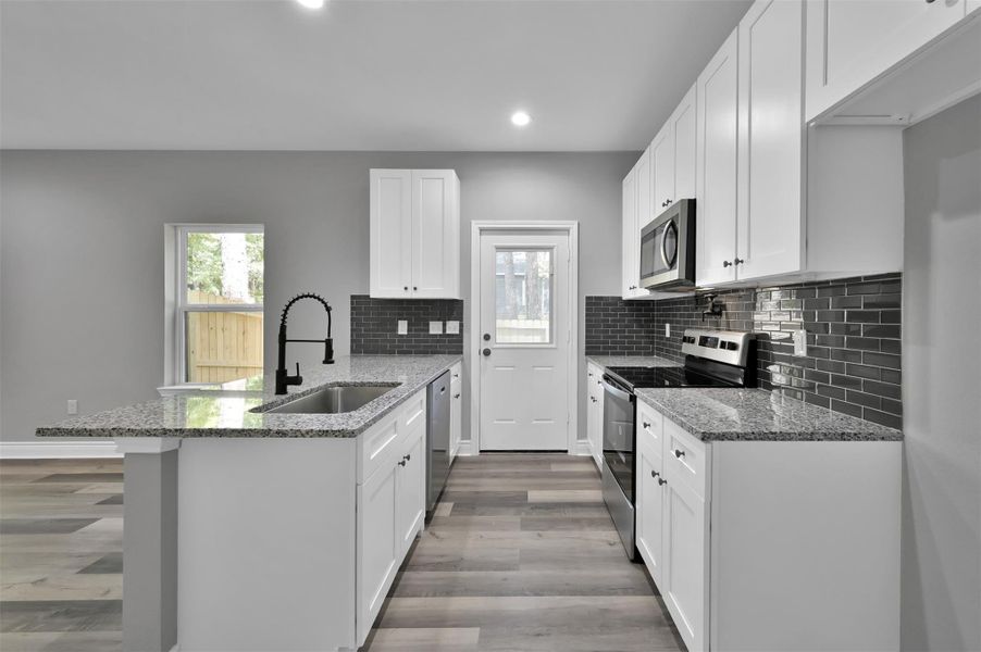 Furnished interior view inside a new home in Lake Conroe Village, Montgomery (Image 2). Furnished interior view inside a new home in Lake Conroe Village, Montgomery (Image 2).