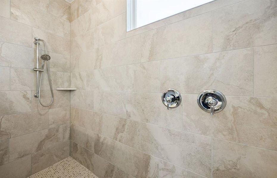 Spacious shower off the primary bedroom