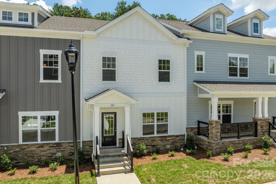 Front exterior of a new home in , Asheville, NC, highlighting curb appeal (Image 2). Front exterior of a new home in , Asheville, NC, highlighting curb appeal (Image 2).