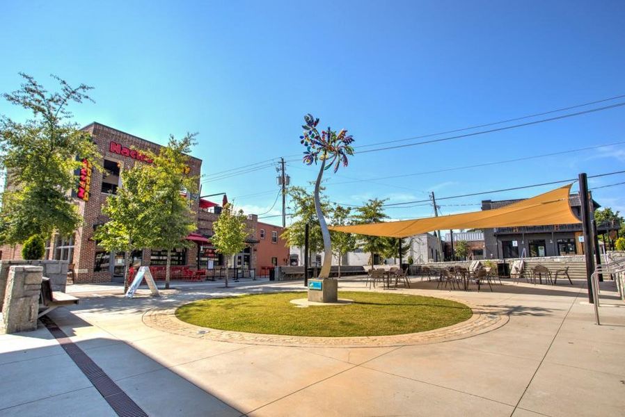 Front exterior of a new home in Riversong, Duluth, GA, highlighting curb appeal (Image 18).