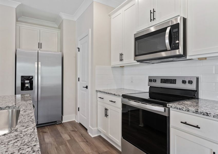 The kitchen comes with stainless steel appliances