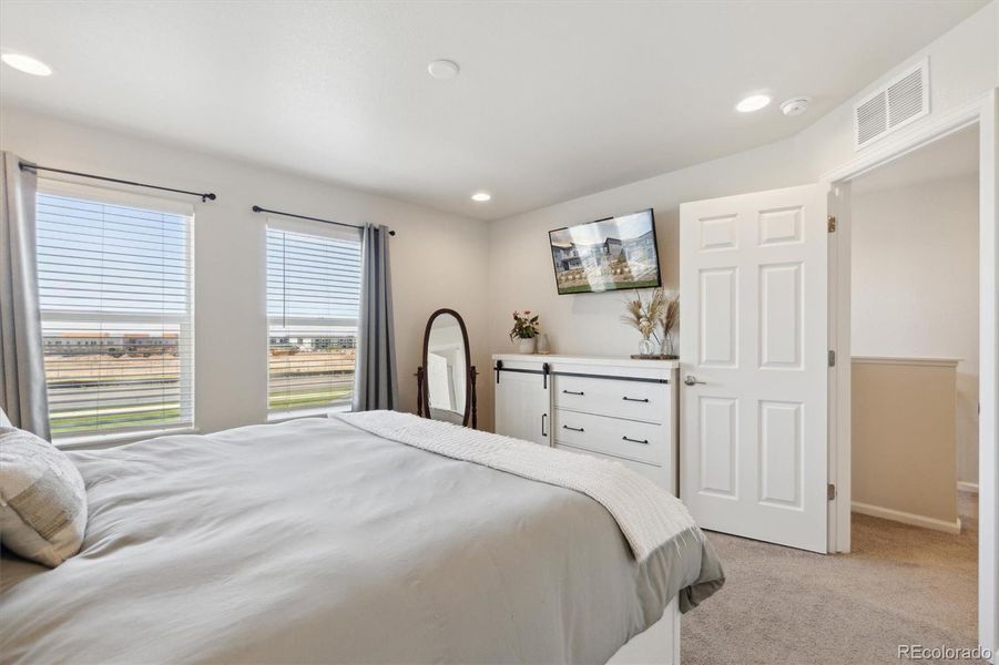 Primary bedroom with En-suite bathroom and mountain view to the west