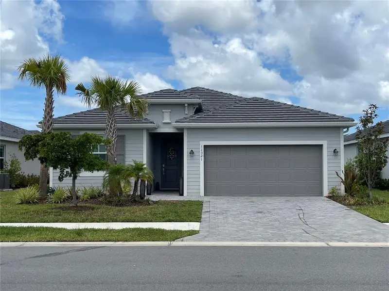 Front exterior of a new home in , Venice, FL, highlighting curb appeal (Image 1). Front exterior of a new home in , Venice, FL, highlighting curb appeal (Image 1).
