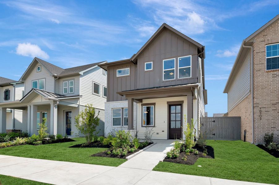 Front exterior of a new home in Jubilee - Cottages Row Collection, Hockley, TX, highlighting curb appeal (Image 2). Front exterior of a new home in Jubilee - Cottages Row Collection, Hockley, TX, highlighting curb appeal (Image 2).