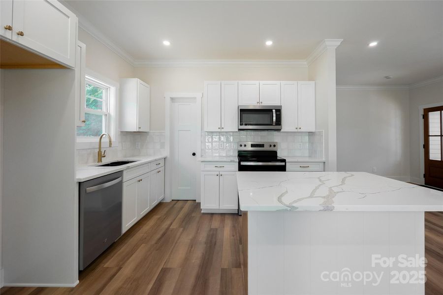 Furnished interior view inside a new home in , Huntersville (Image 11).