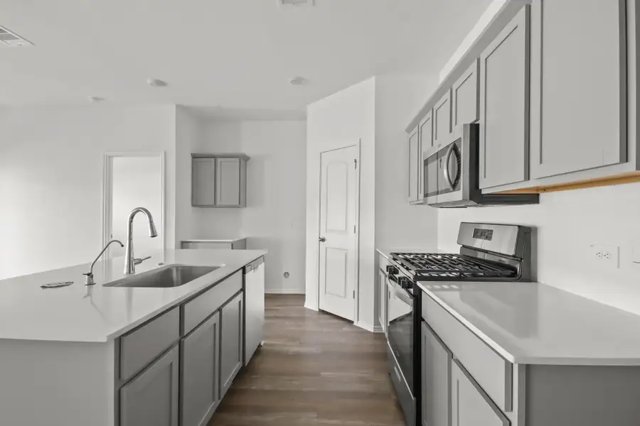 Furnished interior view inside a new home in Grand Pines, Magnolia (Image 5).