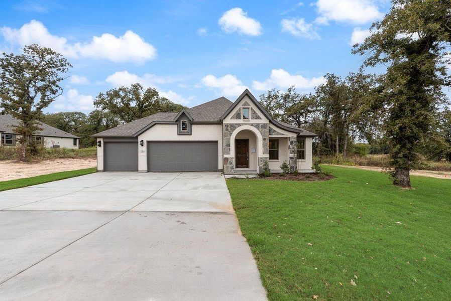 Front exterior of a new home in , Boyd, TX, highlighting curb appeal (Image 1). Front exterior of a new home in , Boyd, TX, highlighting curb appeal (Image 1).