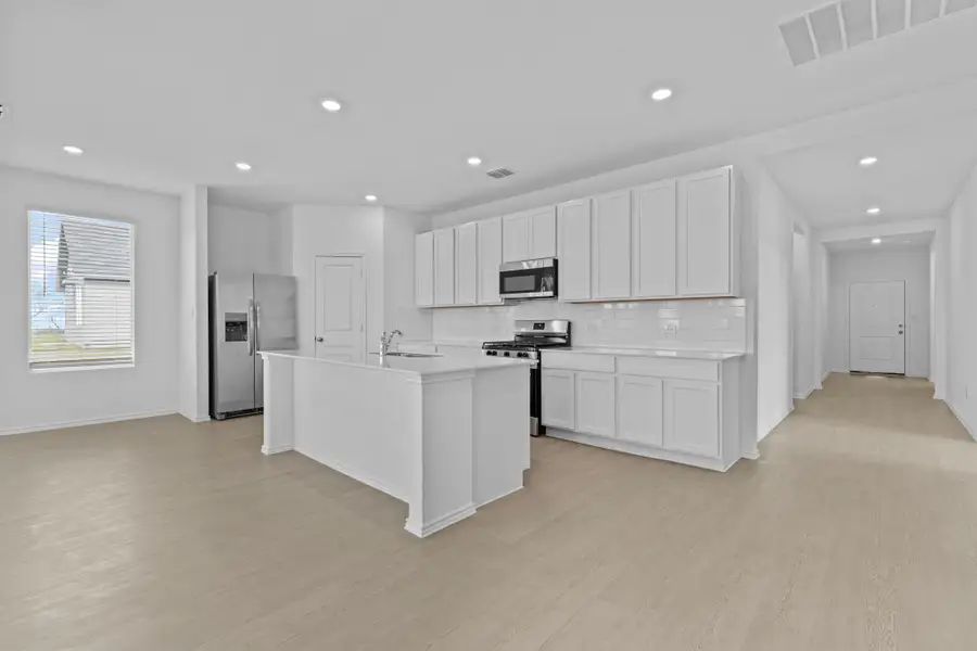 Furnished interior view inside a new home in Schriber Ranch, Mustang Ridge (Image 6).