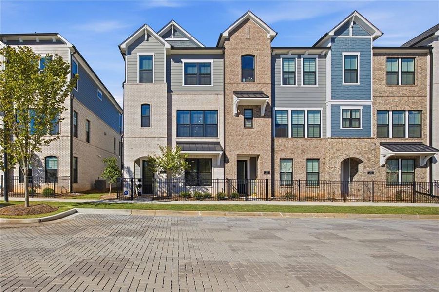 Front exterior of a new home in , Alpharetta, GA, highlighting curb appeal (Image 1). Front exterior of a new home in , Alpharetta, GA, highlighting curb appeal (Image 1).