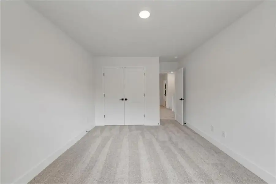 Spacious, unfurnished interior of a new home in Canterbury Villas, Carrollton (Image 23).