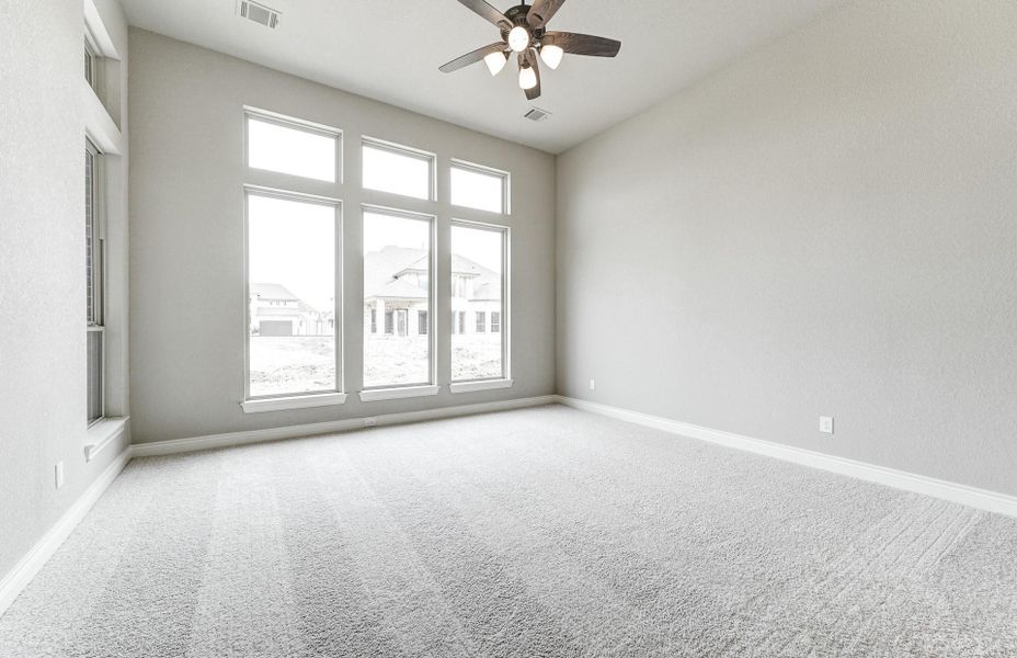 Spacious, unfurnished interior of a new home in The Woodlands Hills 65′, Willis (Image 45).