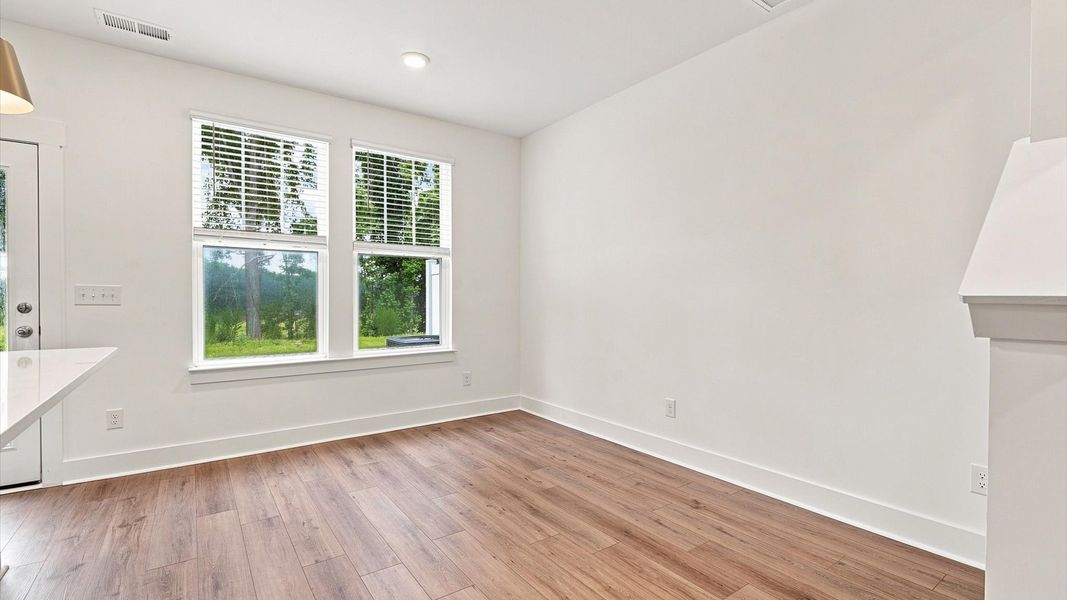 Inviting breakfast area with a seamless connection to the kitchen for everyday living by DRB Homes