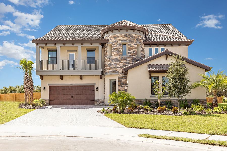 Representative exterior photo of a completed home built from the Madeira III by Homes by WestBay in Two Rivers, Zephyrhills, FL (Image 8).