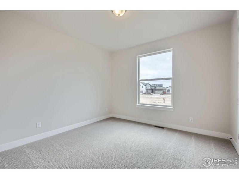 Spacious, unfurnished interior of a new home in RainDance, Windsor (Image 20).