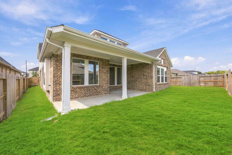 Exterior details and patio area of a home in Arabella on the Prairie, Richmond (Image 2). Exterior details and patio area of a home in Arabella on the Prairie, Richmond (Image 2).