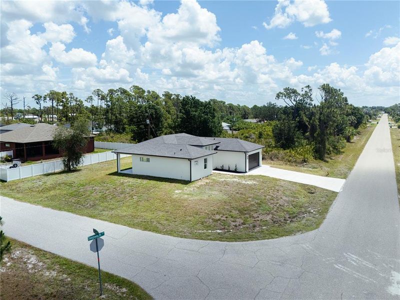 Front exterior of a new home in , Port Charlotte, FL, highlighting curb appeal (Image 25). Front exterior of a new home in , Port Charlotte, FL, highlighting curb appeal (Image 25).