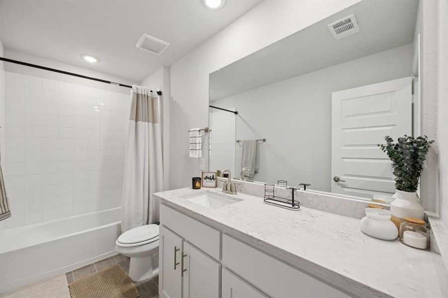 Furnished interior view inside a new home in Prestige Collection at Overland Grove, Forney (Image 24). Furnished interior view inside a new home in Prestige Collection at Overland Grove, Forney (Image 24).